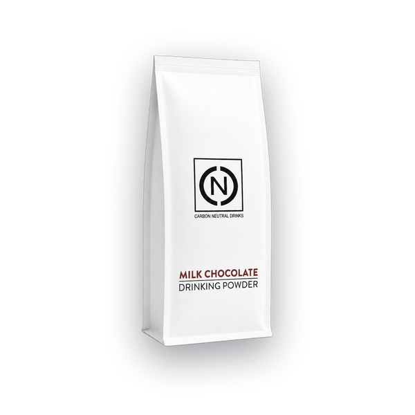 A white stand-up pouch of drinking powder with a black logo and text reading 'MILK CHOCOLATE DRINKING POWDER' on a plain white background.