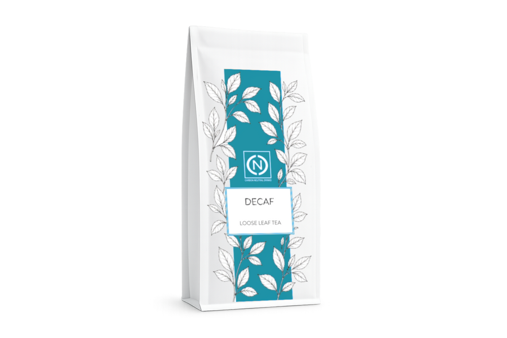 A white stand-up pouch of Decaf Loose Leaf Tea, featuring a teal vertical panel. — photo 1