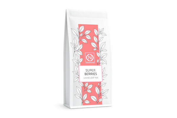 A white stand-up pouch of Super Berries Loose Leaf Tea, featuring a coral pink vertical stripe.